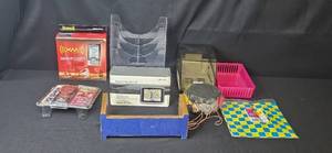 lot 119 image: Mixed Lot Magellan GPS, Office Organizer, VCR Co-Pilot, Gift Wrap, Drum, and Accessories