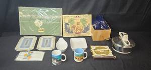 lot 164 image: Kitchenware and Home Decor Lot with Placemats, Ceramic Bakeware, Mugs, and Accessories