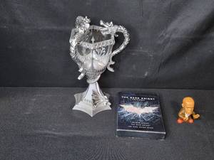 lot 170 image: Movie Memorabilia Lot Harry Potter Triwizard Light Up LED Lamp, Dark Knight Trilogy DVD, 2005 Burger King Star Wars Toy