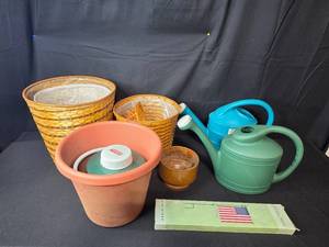 lot 175 image: Assorted Garden Watering Cans, Flower Pots, Baskets, and Garden Stand
