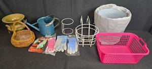 lot 194 image: Mixed Garden Tools and Accessories Lot with Gloves, Baskets, Watering Can, and Plant Holders