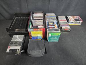 lot 196 image: Vintage Cassette Recorder, Assorted Cassette Tapes, CDs, Blank Tapes, and DVDs Collection