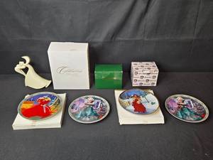 lot 233 image: Set of Collectible Barbie Plates and Figurines Including Christmas Around the World, Snowbabies, and Dreamscicles