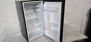 IGLOO Mini Frige with freezer and a dimension of 19"L x 18"W x 33"H (used from a shutdown Hotel)