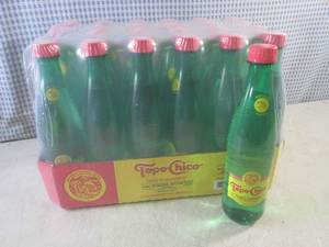 lot 167 image: (C-2) 24-Pack of Topo-Chico Twist o...