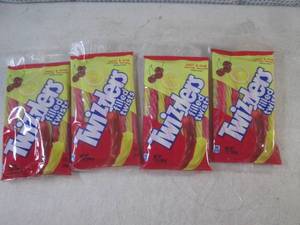 lot 215 image: (B-2) 4 Packages of Twizzlers Sweat...
