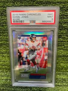 lot 39 image: 2019 Panini Score Chronicles Daniel Jones PSA Graded 9 Mint