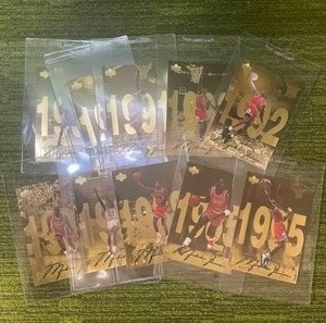 lot 105 image: 1998 Michael Jordan Upper Deck Oversized Gold Foil Card Set