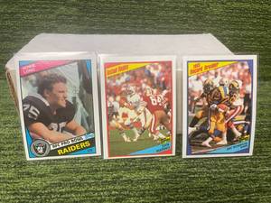 lot 139 image: 1984 Topps NFL Set (#1-396) Missing 338,303,249,246,227,224,221,159,123,63