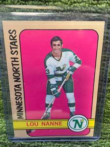 lot 404 image: 1972-73 Topps Hockey Trading Card Lou Nanne- Minnesota North Stars