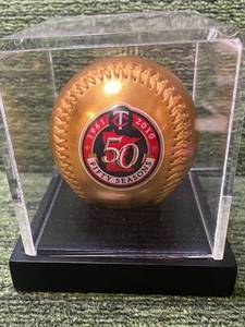 lot 420 image: Minnesota Twins Fifty Seasons Gold Encased Baseball 1961-2010