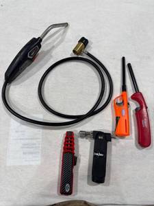 lot 0716 image: Assorted Torches and Lighters