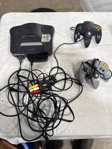 lot 0855 image: Nintendo 64 Console & Controllers
