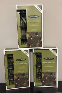 lot 484R image: Three New Sets Smith & Hawken Outdoor String Lights with Metal Cage Covers