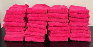 lot 615R image: MB - Set of 34 Hot Pink Hand Towels