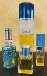 lot 773C image: K - Set of 4 Mens Fragrances Including YSL Opium, 4711, Tuscany, and Chanel Pour Monsieur