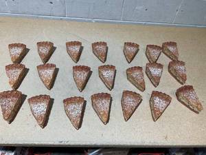 lot 228 image: LOT OF 21 THRESHOLD UNSCENTED Apple Pie Slice Wax Figural Candles