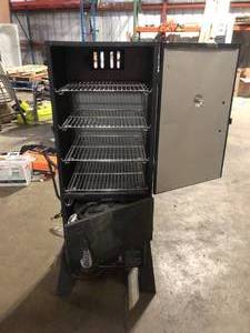 lot 38 image: Masterbuilt 30 in. Dual Fuel Propane Gas and Charcoal Smoker in Black, 731 sq. in. of Cooking Space  Damaged Mising Piece Customer Returns See Pictures