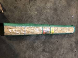 lot 60 image: Backyard X-Scapes 6 ft. H x 16 ft. L Natural Jumbo Reed Bamboo Fencing     Customer Returns See Pictures