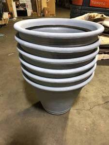lot 64 image: Lot of 6 22 in. Alameda Extra Large Gray Plastic Planter customer return see pictures