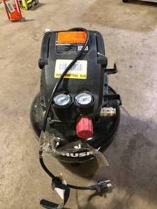 lot 27 image: Husky 3 Gal. 120 PSI Portable Electric Oil-Free Light Duty Pancake Air Compressor with Fold Down Handle and 1-Quick Coupler Customer Returns See Pictures