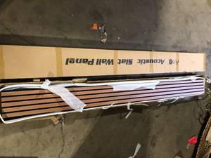 lot 31 image: Lot of Art3dwallpanels Walnut 0.83 in. x 0.65 ft. x 8 ft. Wood Slat Acoustic Panels, MDF Decorative Wall Paneling (4 Piece21 sq. ft.)   Customer Returns See Pictures