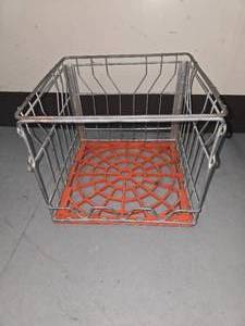 lot 30 image: vintage milk crate with orange bottom