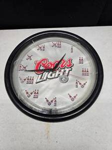 lot 11 image: Coor Light Clock, works