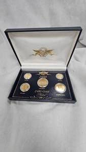 lot 21 image: 2000 24Kt Gold Plated Coin Set(5)