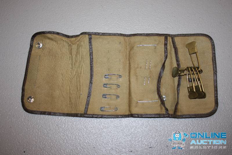 lot 194 image: U.S. Military Sewing Kit wSafety Pins. Includes Contents.