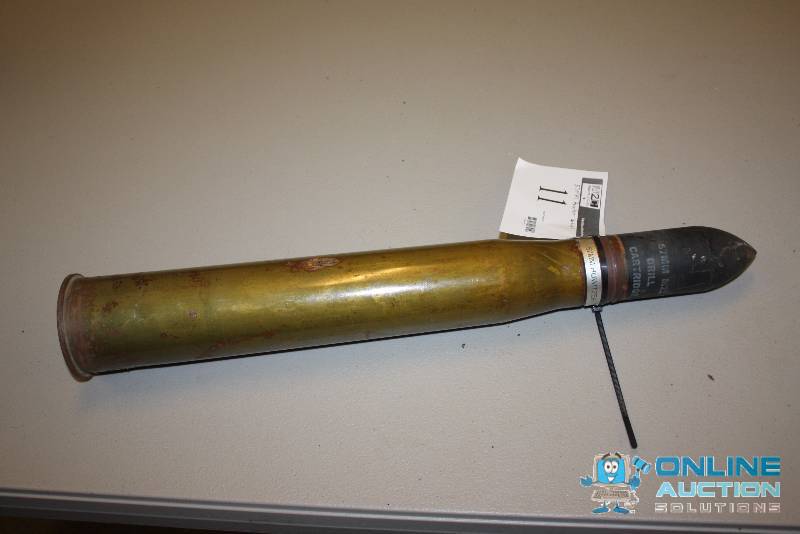 lot 11 image: 57mm M22 Drill Cartridge Howitzer Cartridge.
