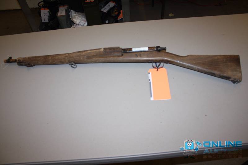 lot 16 image: WWII Wood Training Rifle.