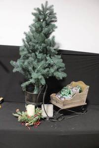 lot 4 image: Holiday Decor Lot with Artificial Tree, Sleigh, Ornaments, and Candle Display