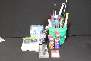 lot 22 image: Bucket of Home Improvement Supplies with Caulk, Rollers, and Tools