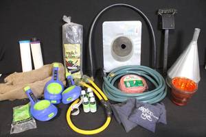 lot 25 image: Collection of Lawn and Garden Supplies Including Hose, Mulch Film, Extension Cord, and Accessories
