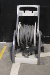 lot 31 image: Suncast Hose Reel Cart with Zero-G Garden Hose and Spray Nozzle