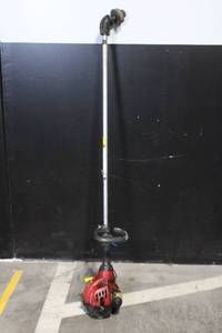 lot 34 image: Homelite Zip Start 25cc Gas String Trimmer