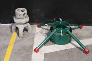 lot 37 image: Metal Christmas Tree Stand and Concrete Outdoor Decorative Stand
