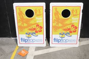 lot 39 image: FlipFlop Wines Branded Cornhole Game Set with 2 Boards and 2 Bean Bags