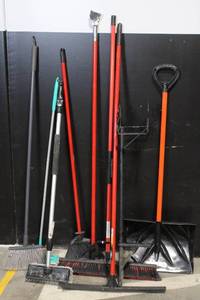 lot 47 image: Lot of Floor Cleaning Tools with Brooms, Snow Shovels, Squeegees, and Holders