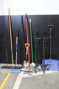 lot 48 image: Collection of Yard and Snow Tools with Shovels, Brooms, Rake, and Snow Pusher
