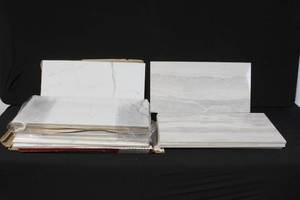 lot 67 image: Lot of Rectangular Porcelain Wall Tiles, White and Gray Marble Pattern, 24in x 12in
