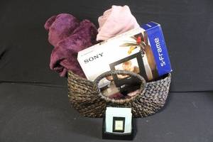 lot 75 image: Home Decor Bundle with Sony 7in Digital Photo Frame, Throw Blankets, Glass Coasters, and Woven Basket