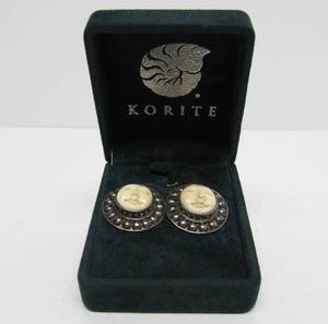 lot 31 image: New in Box Korite Carved Bone &amp Sterling Silver Face Earrings