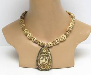lot 37 image: Very Cool Vintage Carved Bone Tibetan Skull Necklace