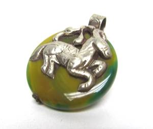 lot 53 image: Vintage Oriental Horse Pendant on GreenYellow Swirled Stone