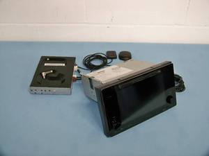 lot 50 image: Toyota Tahoma OEM Stereo  Radio AMFM Receiver with Display and GPS