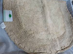 lot 73 image: Double Ruffle 24 x 40 Tan Bath Rug...