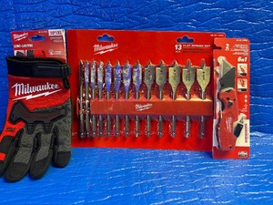 lot 24 image: Milwaukee stocking  Stuffers - 6 in1knife - 13 PC Flat boring set and 10XL gloves