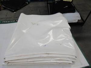 lot 137 image: NEW Vinyl Tarp - 5 x 80 White  White Vinyl tarp - 20 oz. Heavyweight Duty